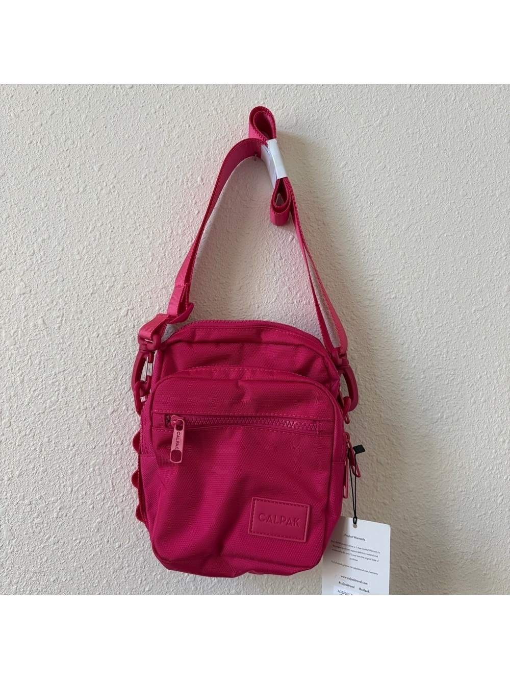 Calpak Stevyn Mini Crossbody Bag in Dragon Fruit